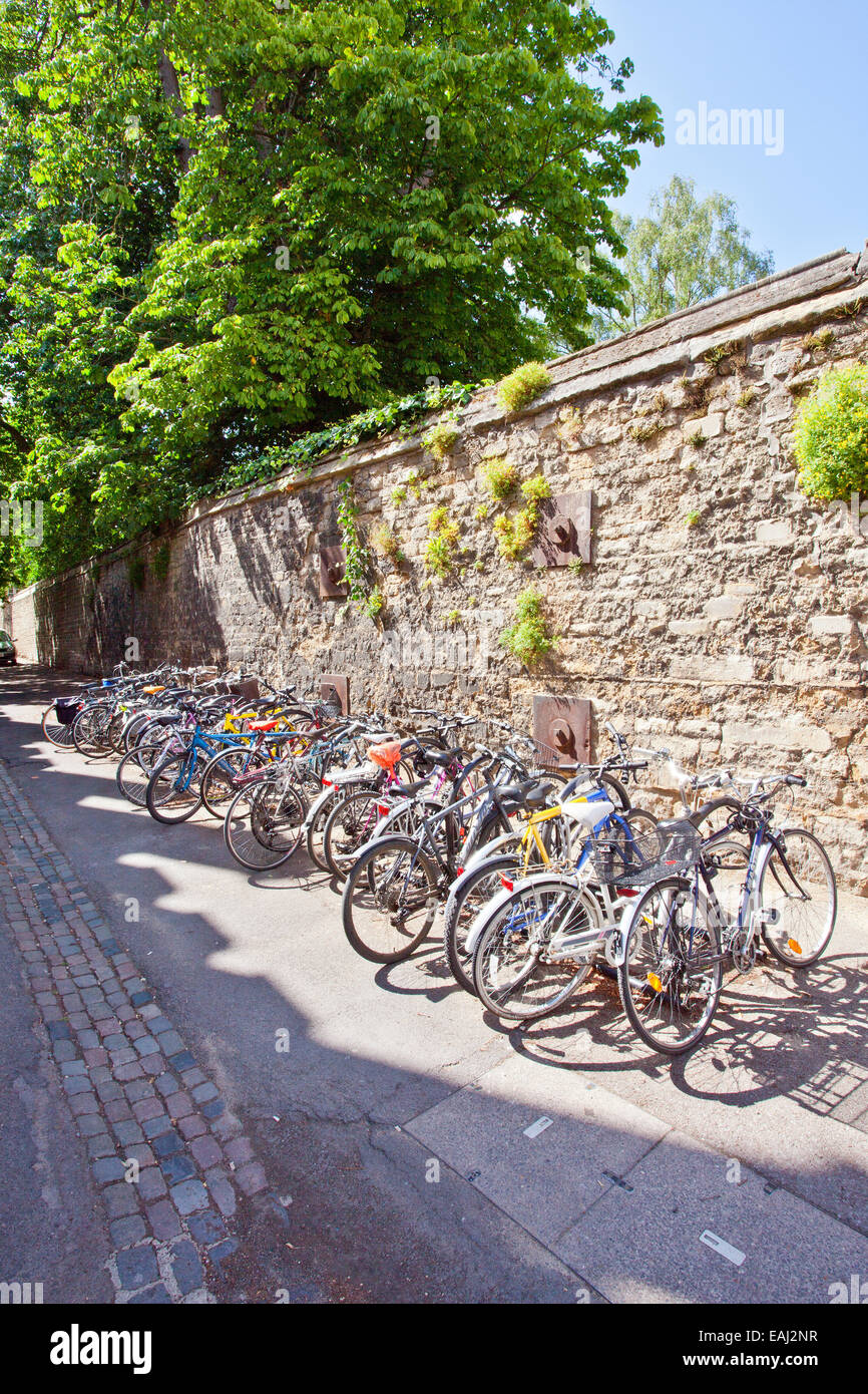 A collection of student bicycles parked in Brasenose Lane in Oxford England UK Stock Photo