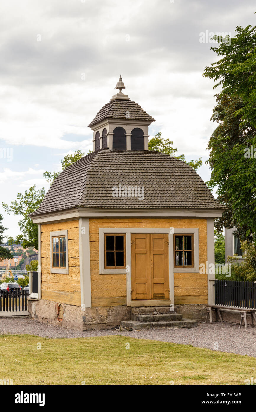 Yellow painted wooden guards' hut, Skansen open-air museum and zoo, Djurgarden, Stockholm, Sweden Stock Photo