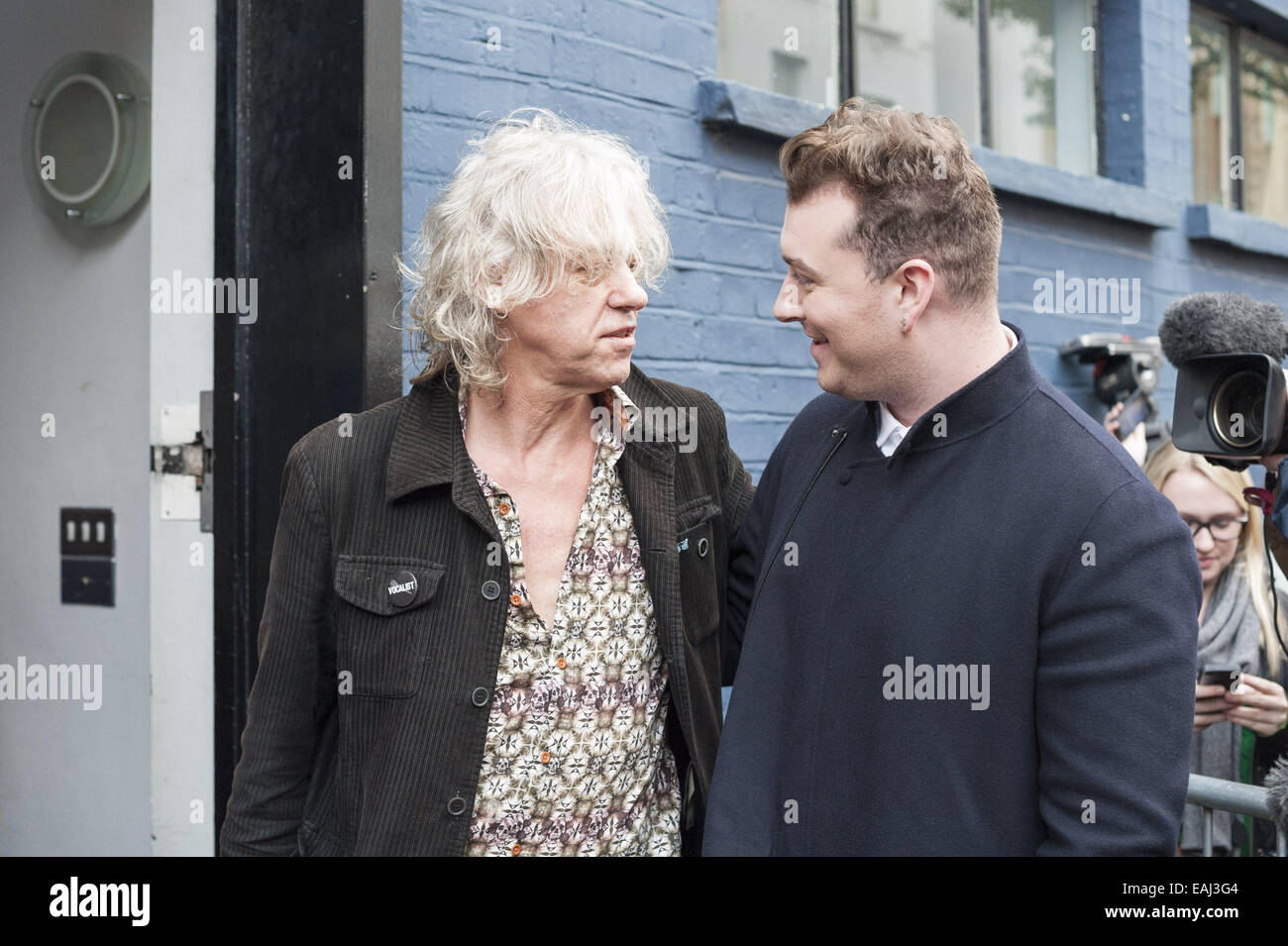 London, UK. 15th November, 2014. Artists arrive at Sarm Studios in Notting Hill, west London, to record Band Aid. Pictured: Bob Geldof and Sam Smith. © ZUMA Press, Inc./Alamy Live News Stock Photo