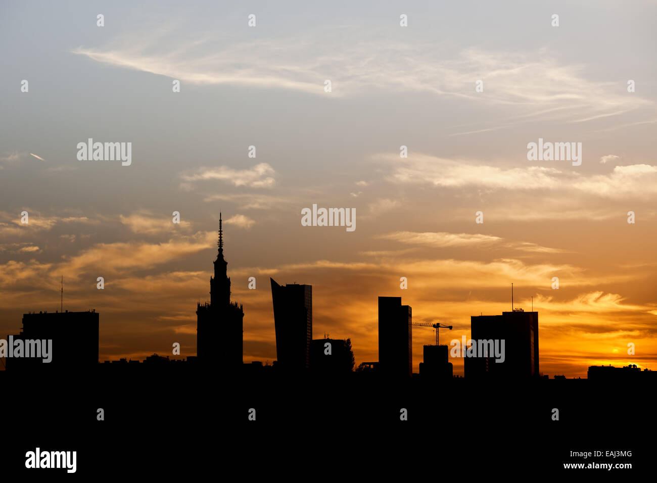 Warsaw city downtown skyline silhouette against a sky at sunset in ...