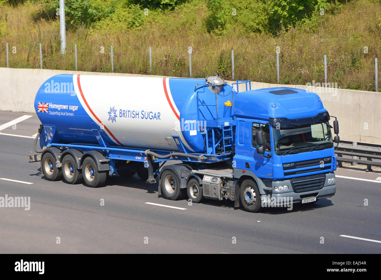 British sugar from beet crop a business brand of Associated British Foods tanker trailer & supply chain lorry truck driving along English motorway UK Stock Photo