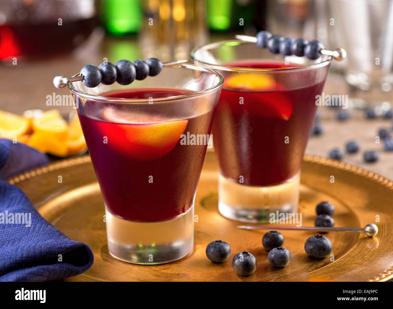 Two delicious blueberry cocktails with blueberry juice and lemon Stock