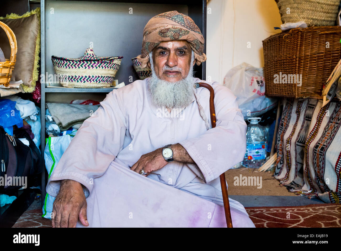An elderly Omani shop keeper. Muscat, Oman. Stock Photo