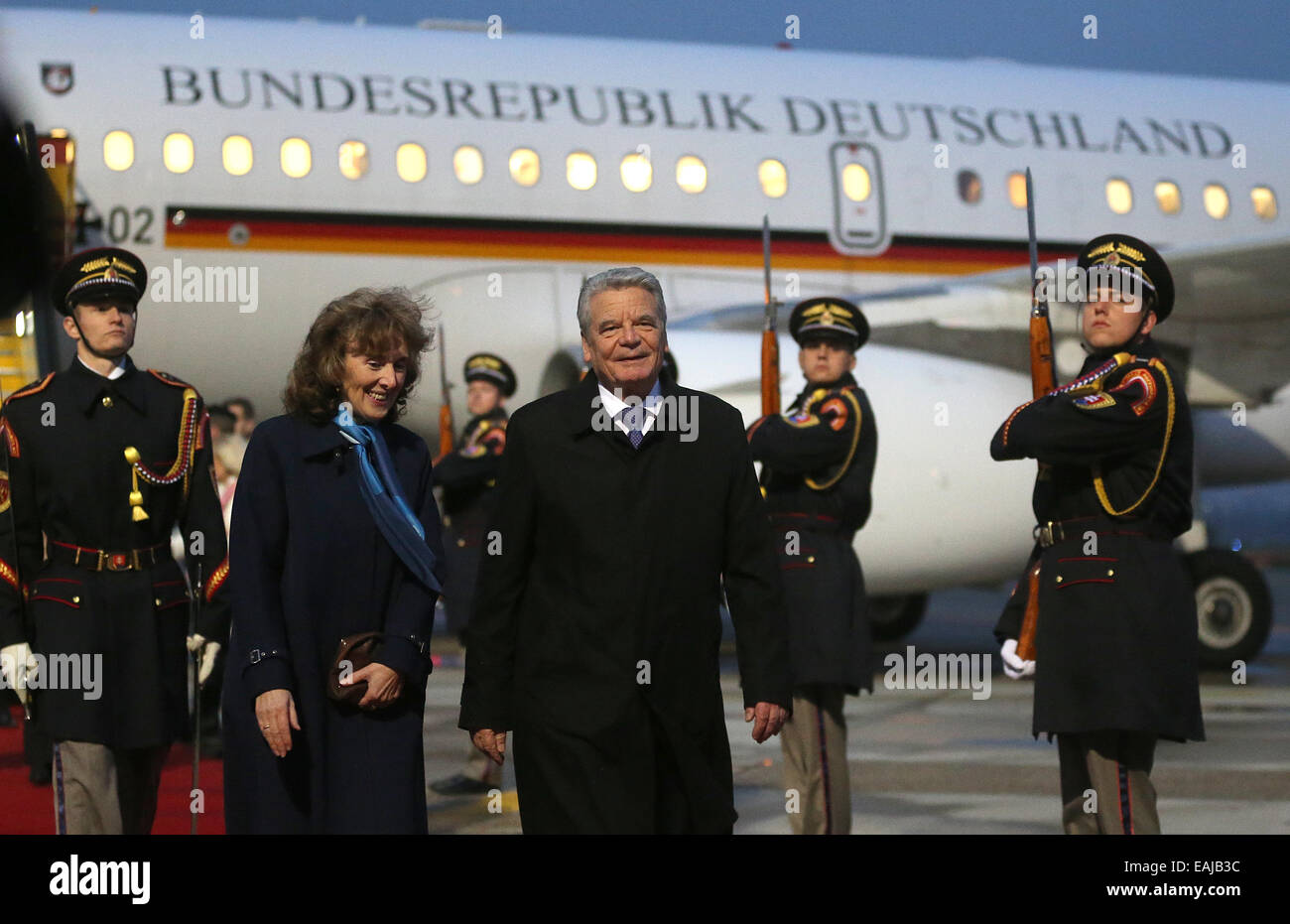 Bratislava, Slovakia. 16th Nov, 2014. German President Joachim Gauck (C) is welcomed with military honours at the airport in Bratislava, Slovakia, 16 November 2014. Gauck participates at the meeting of the presidents of the Visegrád states and of Germany on occasion of the commemoration '25 Jahre Friedliche Revolution' (lit. '25 years of peaceful revolution'). Photo: Wolfgang Kumm/dpa/Alamy Live News Stock Photo