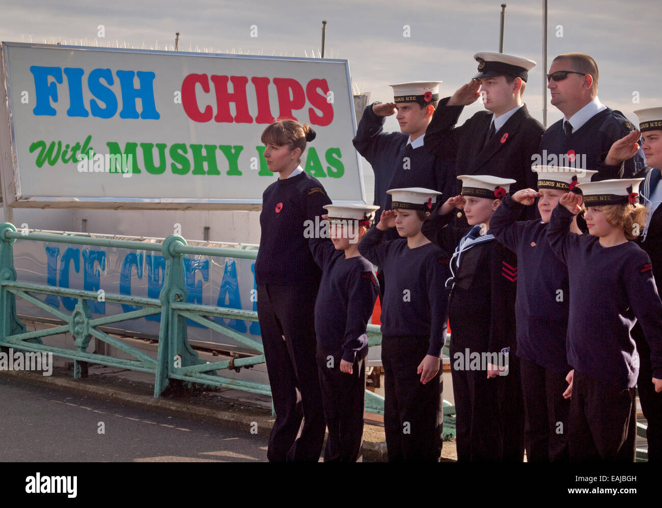 Sea Cadets stand to attention at a Remembrance Day ceremony in Brighton Stock Photo