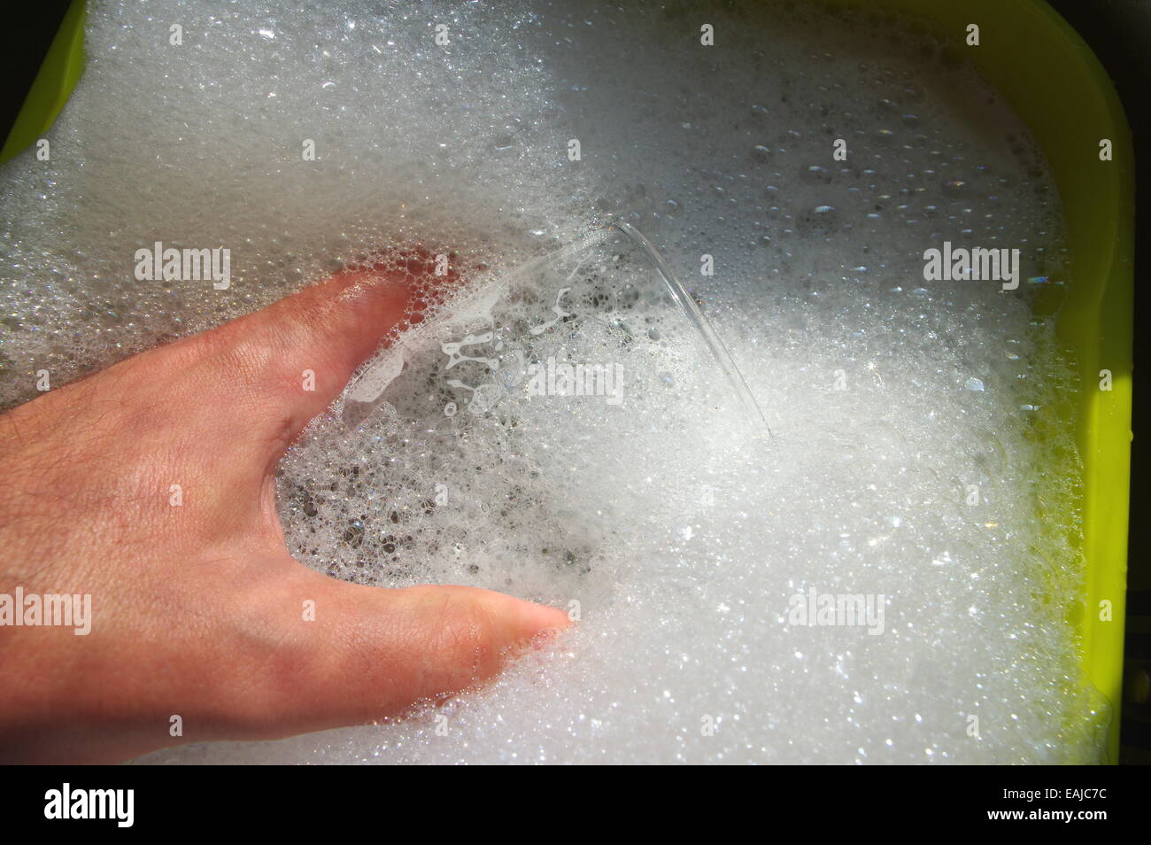 Hand washing glass Stock Photo