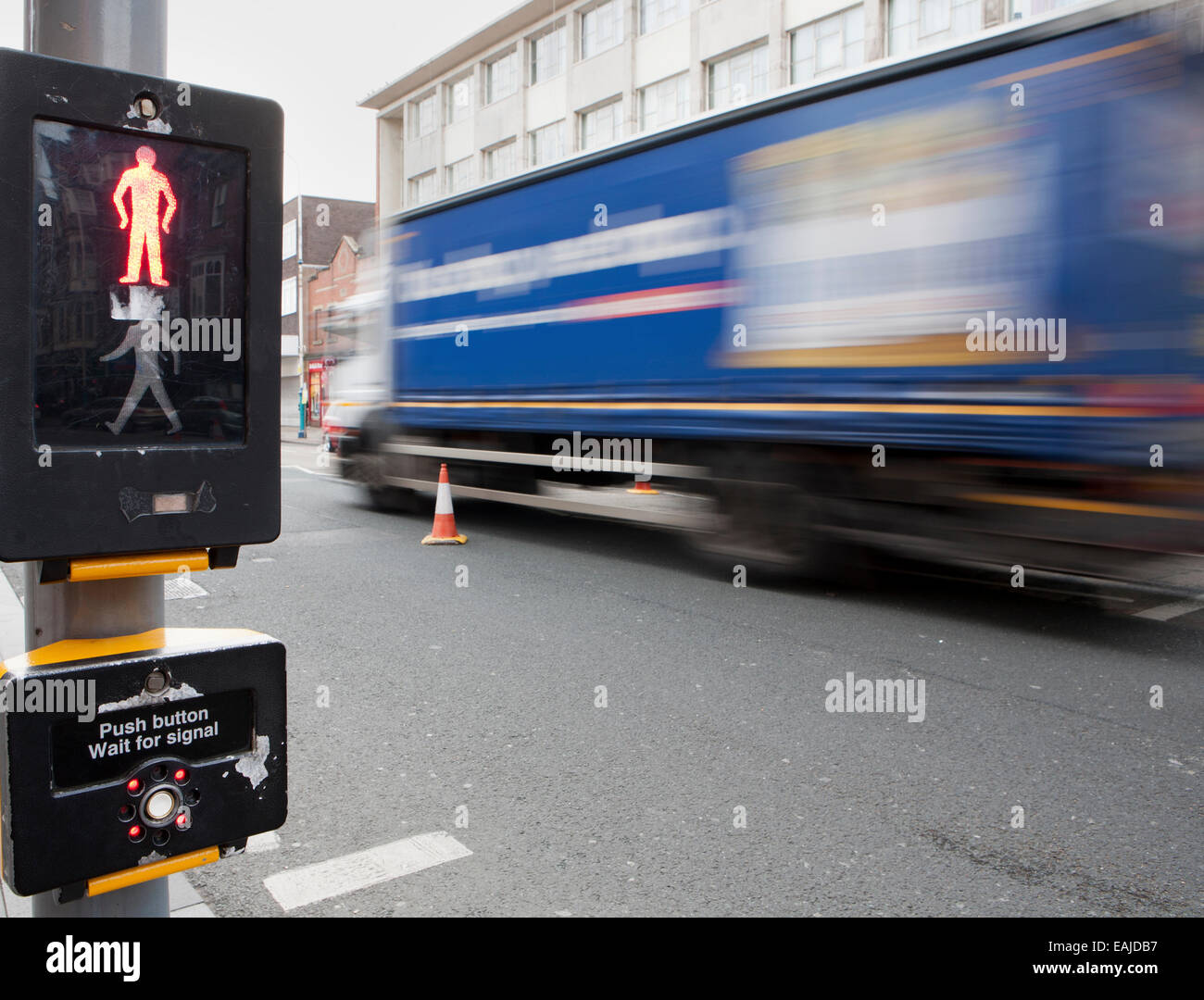 Motion blurred people crossing at pelican crossing Southport, Merseyside, UK Stock Photo