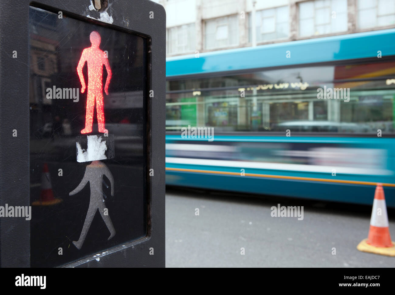 Motion blurred people crossing at pelican crossing Southport, Merseyside, UK Stock Photo