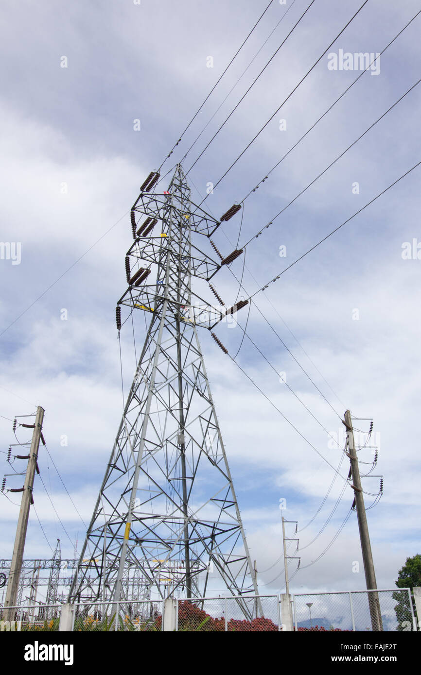 high voltage post.High-voltage tower cloudy sky background Stock Photo ...