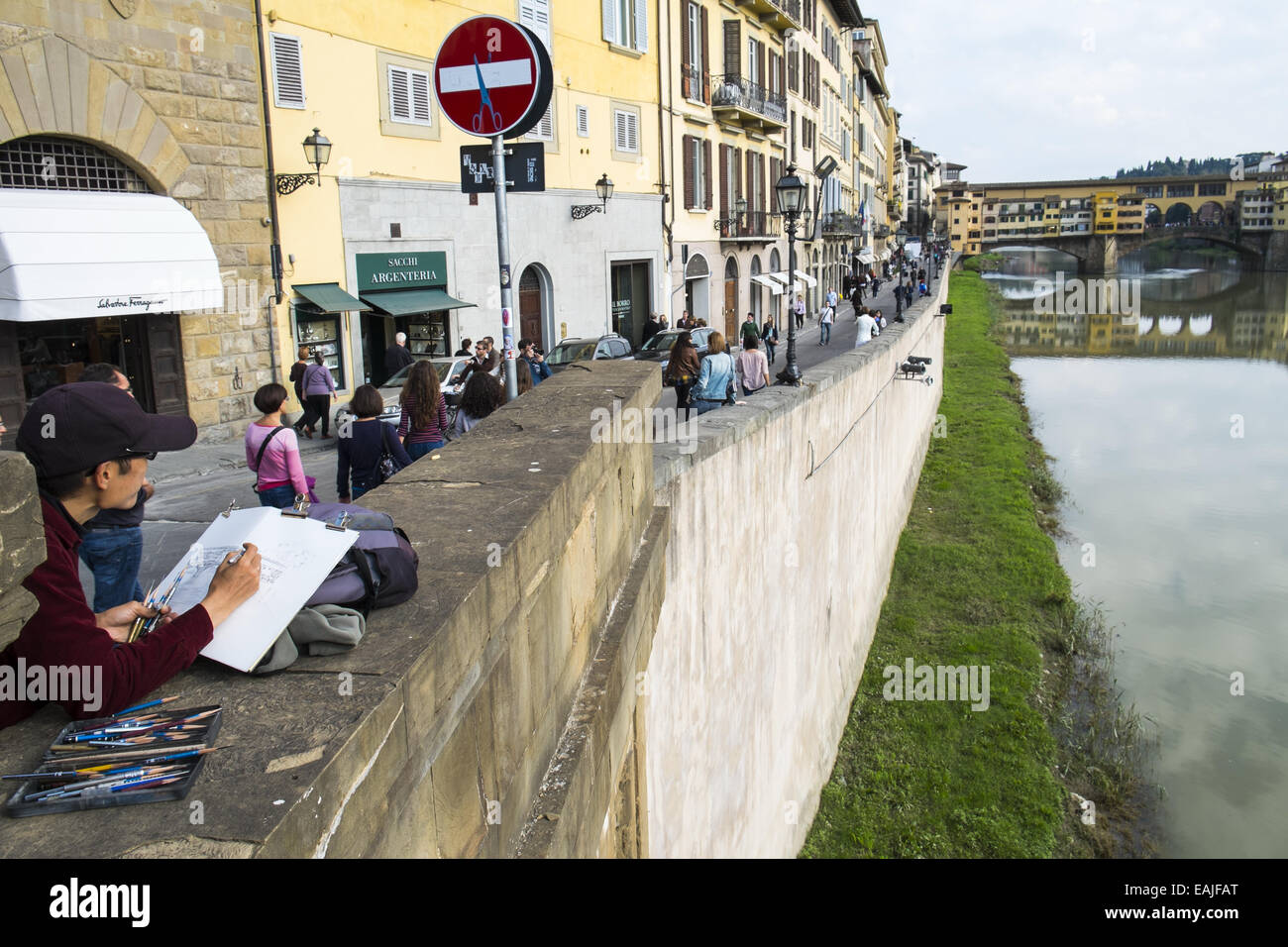 An artist is making an drawing or painting of Ponte Vecchio in Florence,Italy Stock Photo