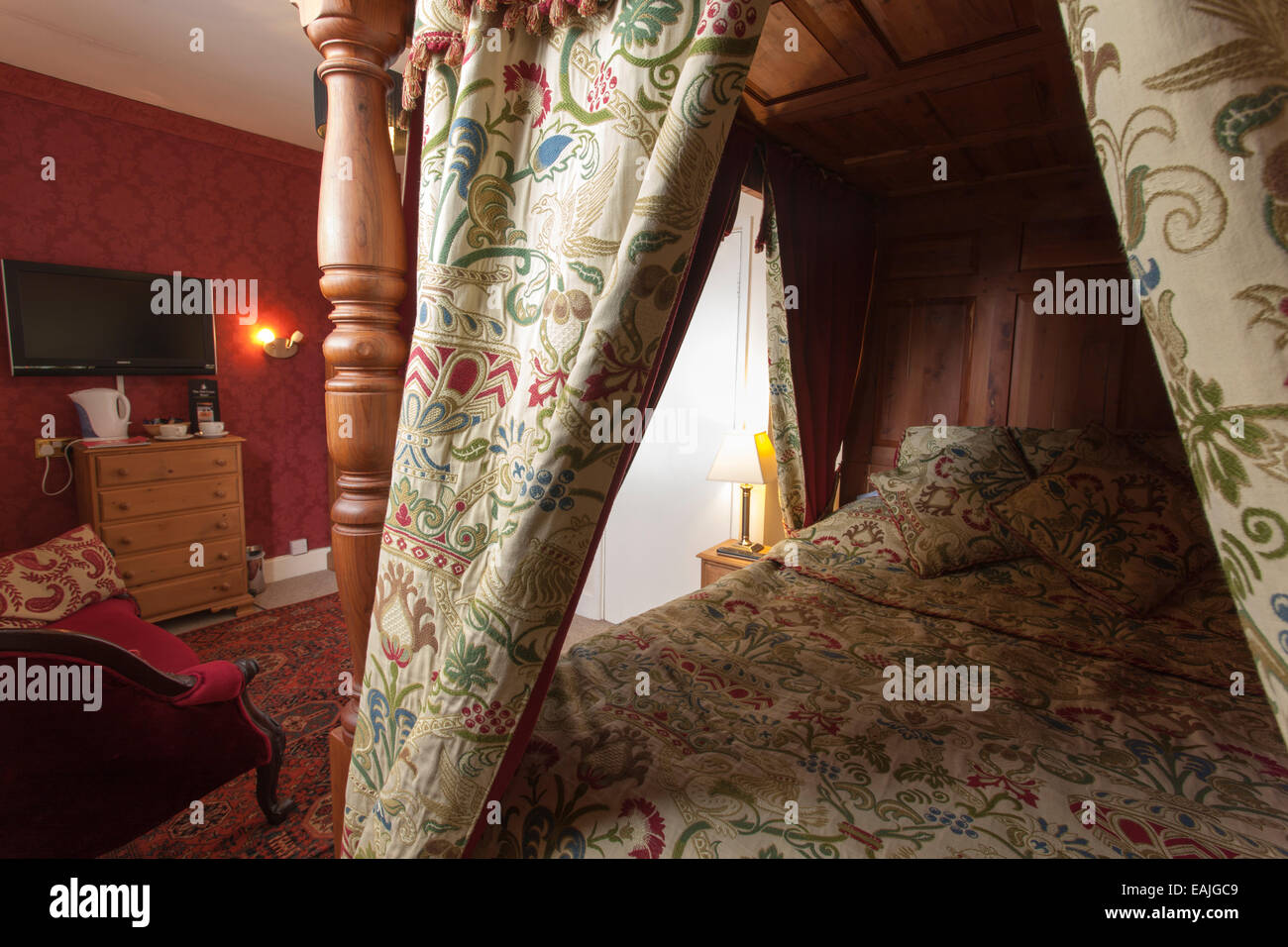 Four poster bed in a hotel bed and breakfast room Stock Photo