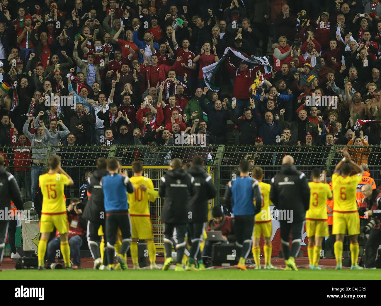 Brussels, Belgium. 16th Nov, 2014. Wales' fans celebrate at the final whistle.- European Qualifier - Belgium vs Wales- Heysel Stadium - Brussels - Belgium - 16th November 2014 - Picture David Klein/Sportimage. Credit:  csm/Alamy Live News Stock Photo
