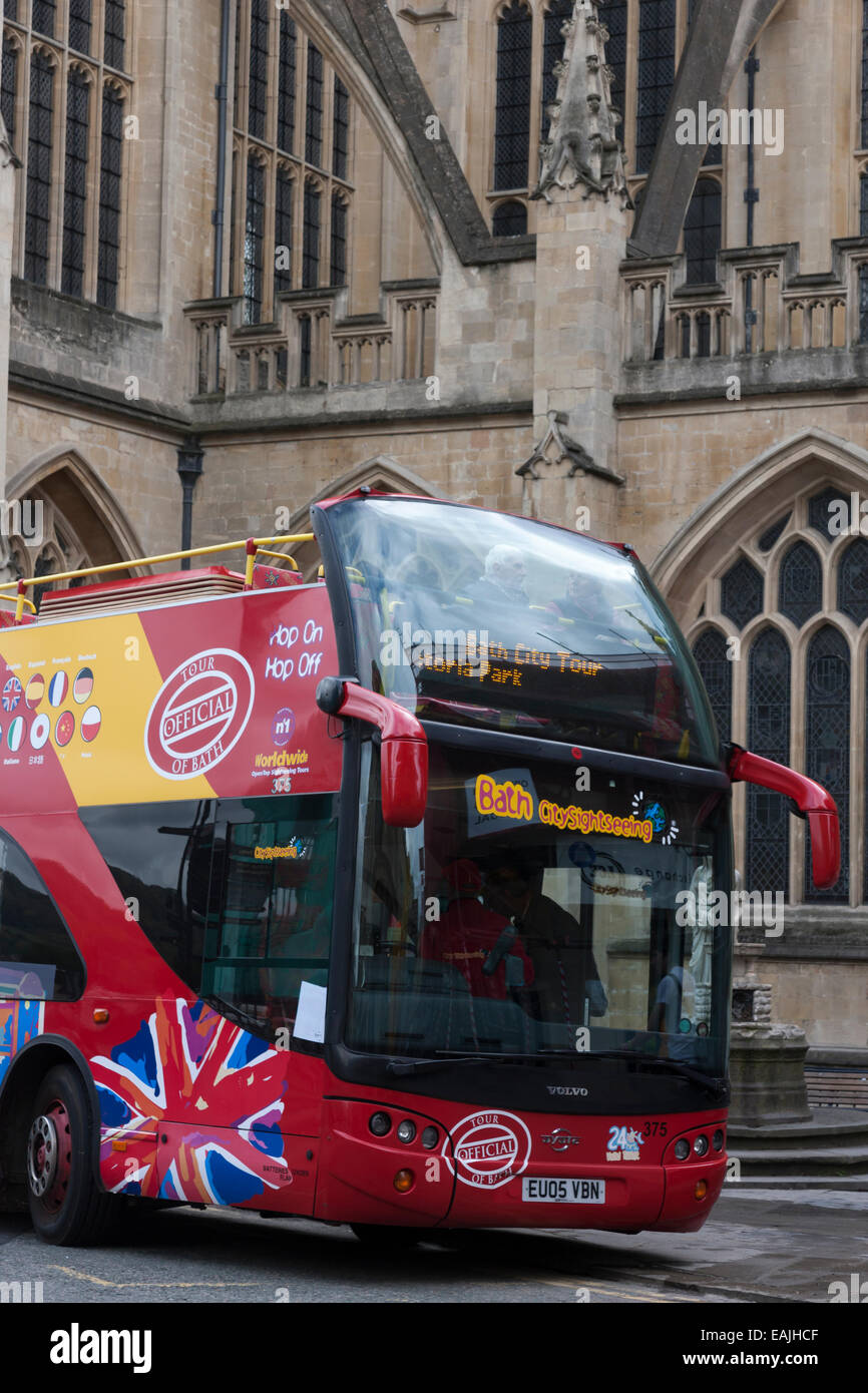 City Sightseeing tour bus and signpost in Bath, Somerset Stock Photo