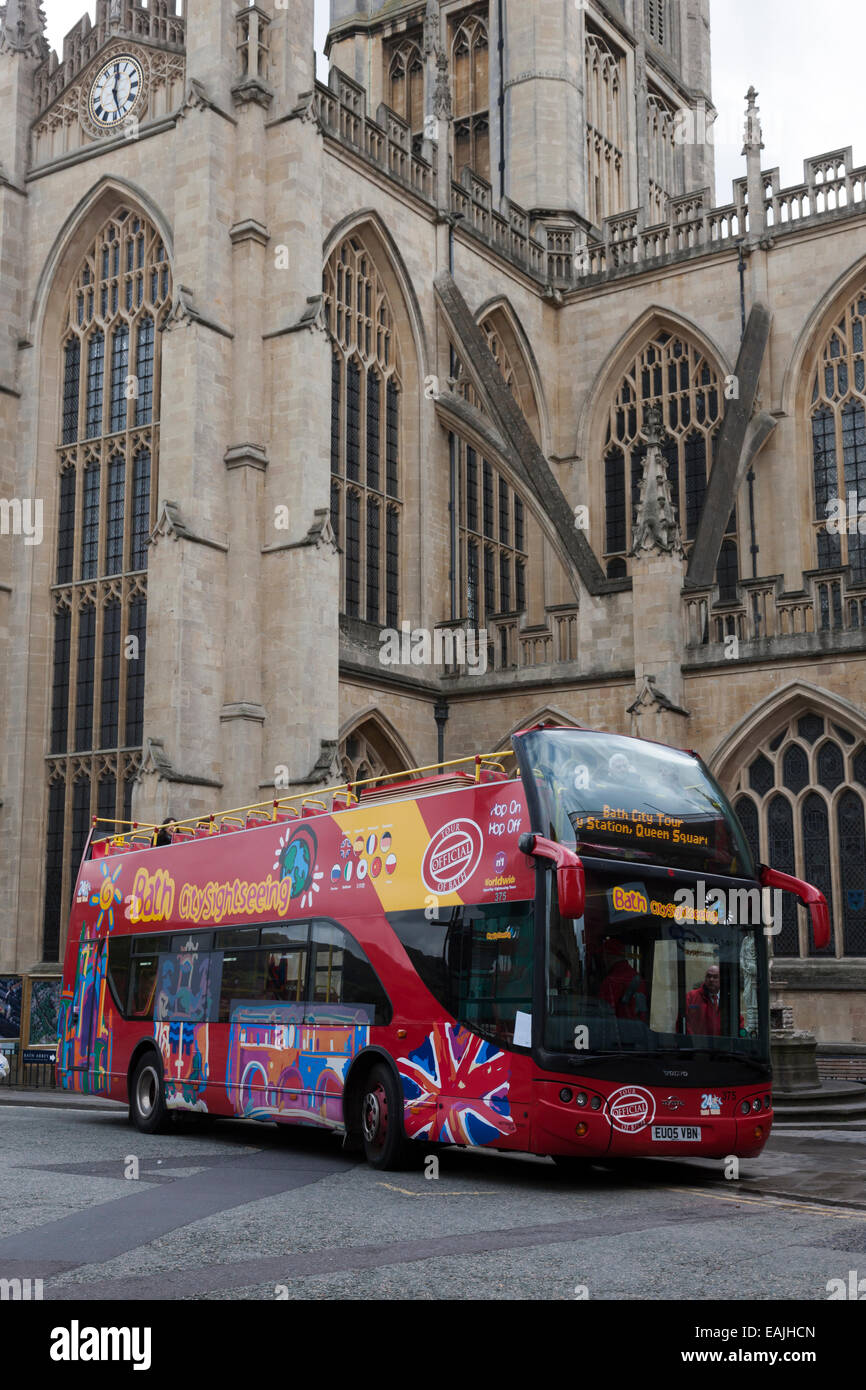 City Sightseeing tour bus and signpost in Bath, Somerset Stock Photo
