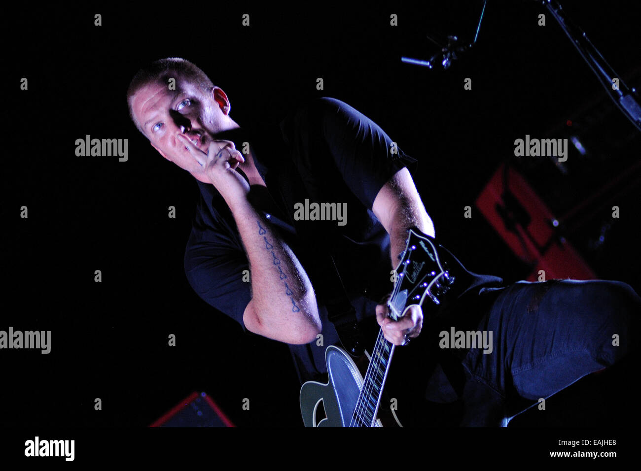 BENICASIM, SPAIN - JULY 18: Josh Homme, singer of Queens of the Stone Age (band), tell to shut up at FIB. Stock Photo