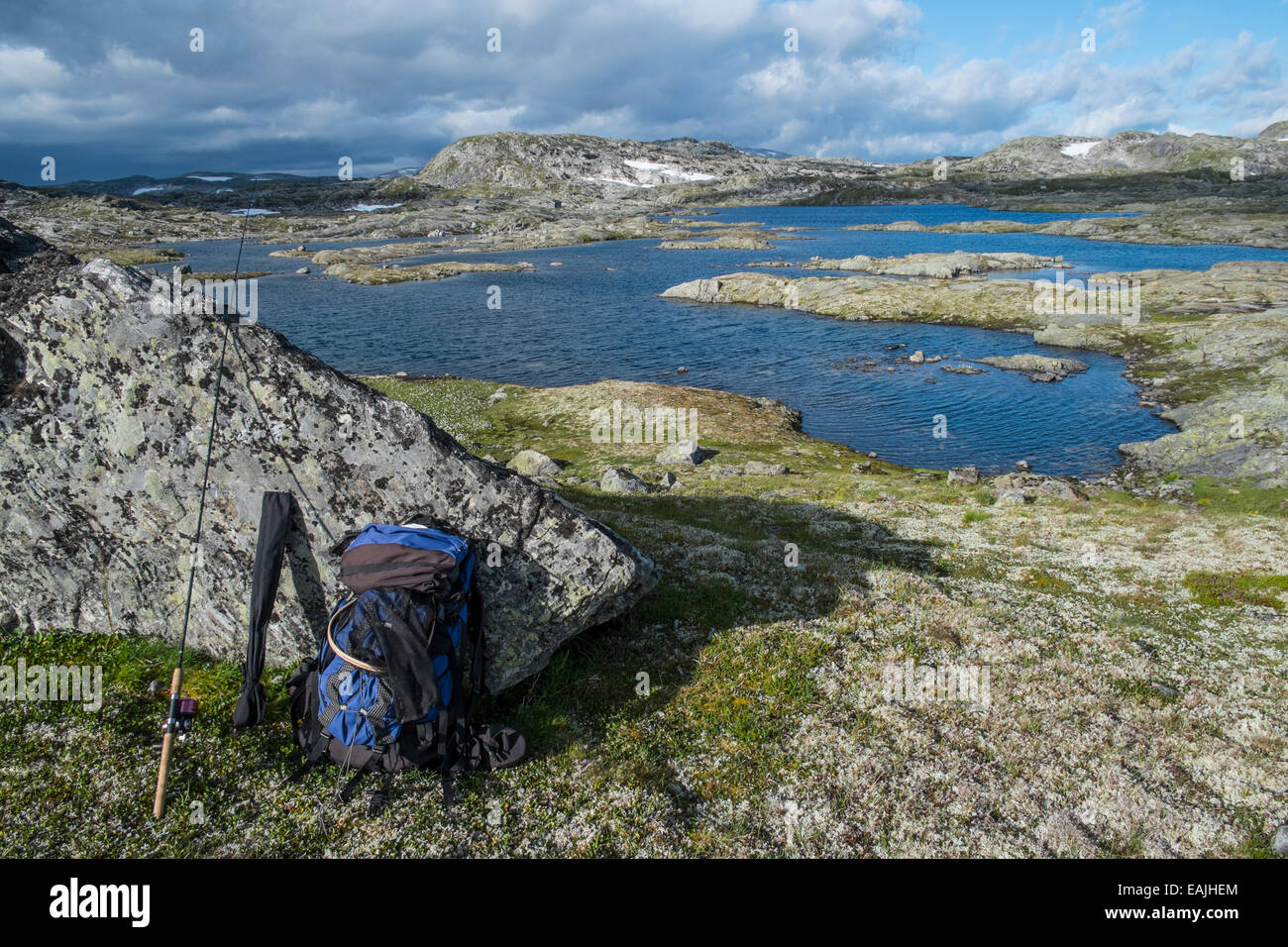 rucksack and fishing rod in Hardangervidda national park Stock Photo