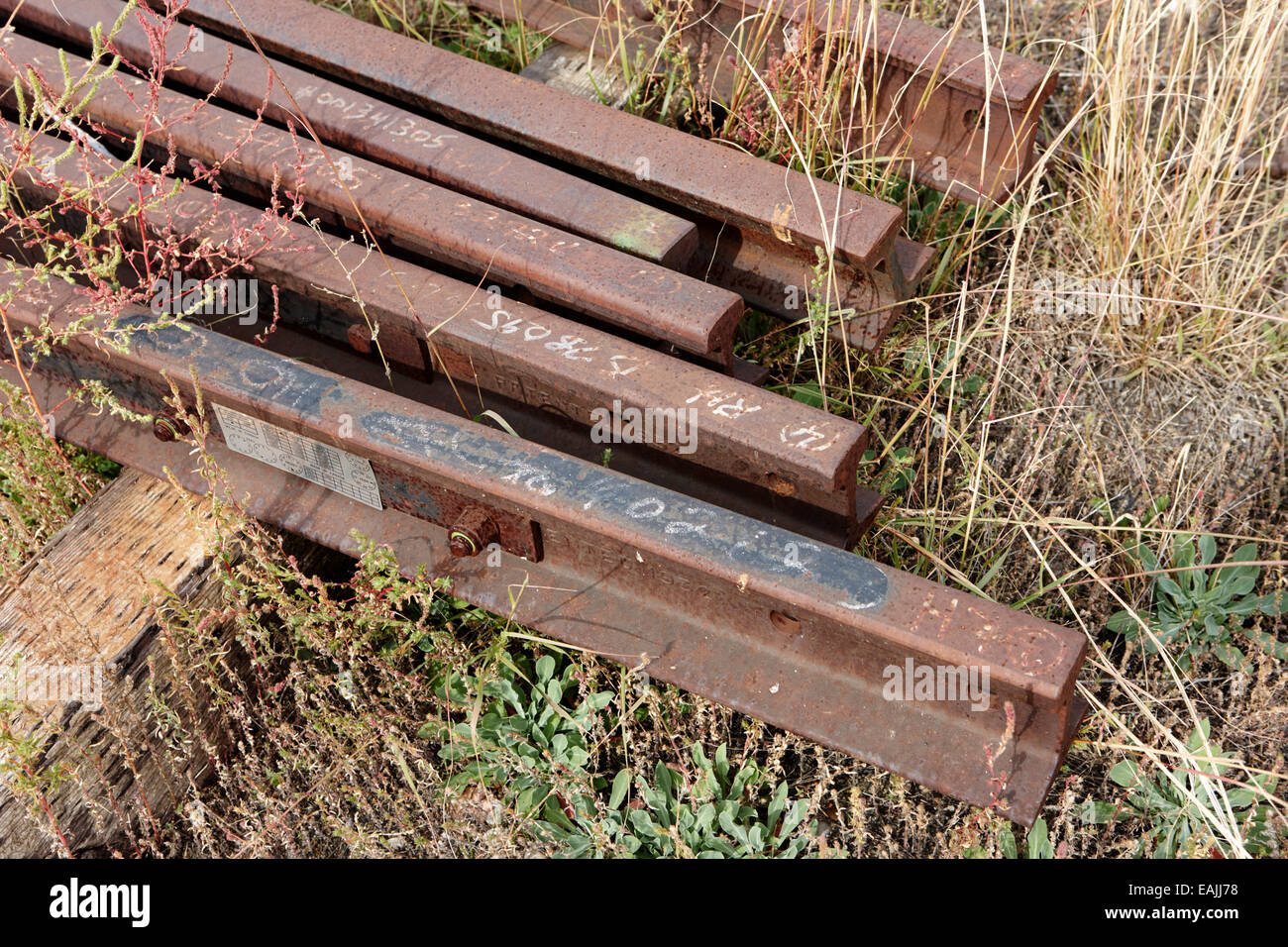 spare train track rails in a railway yard Saskatchewan Canada Stock Photo