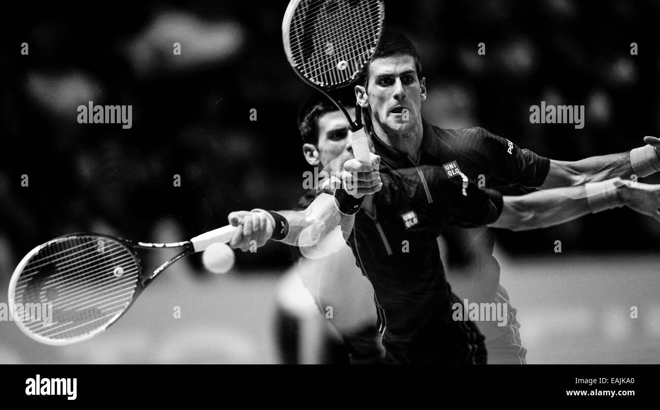 London, UK. 16th Nov, 2014. ATP World Tour Finals. Novak Djokovic versus Andy Murray, exhibition match. Multiple (in-camera) exposure of Novak Djokovic in action Credit:  Action Plus Sports/Alamy Live News Stock Photo