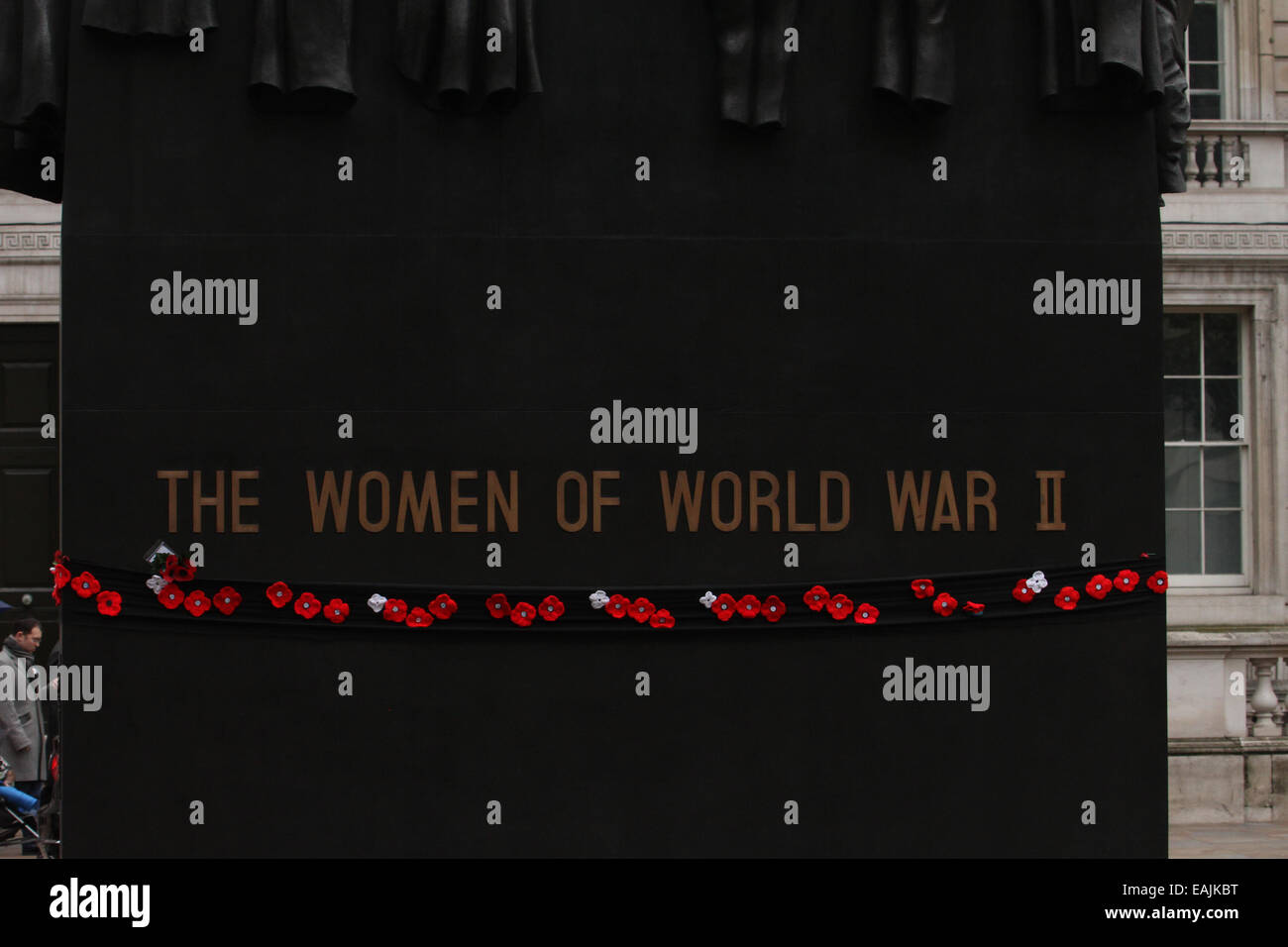London, UK 16 November 2014. The Women of World War II memorial laced with poppies during the  Jewish community in London attend a Remembrance Parade. Photo: David Mbiyu/ Alamy Live News Stock Photo