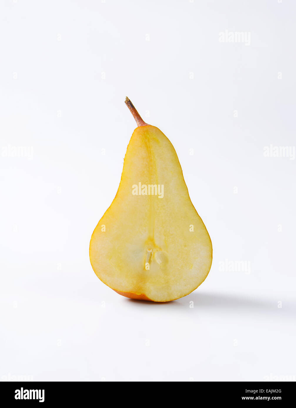 Ripe Bosc pear half - cross section Stock Photo
