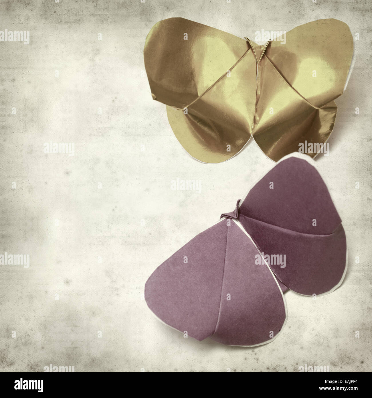 textured old paper background with kirigami butterfly Stock Photo