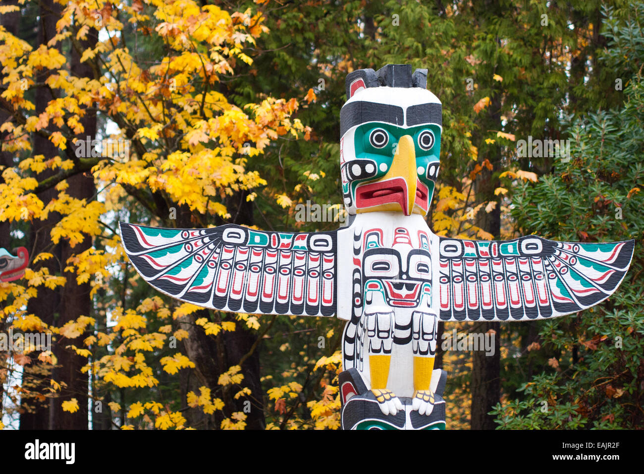 The famous totem poles at Brockton Point, Stanley Park, Vancouver, British Columbia, Canada, in fall (autumn). Stock Photo