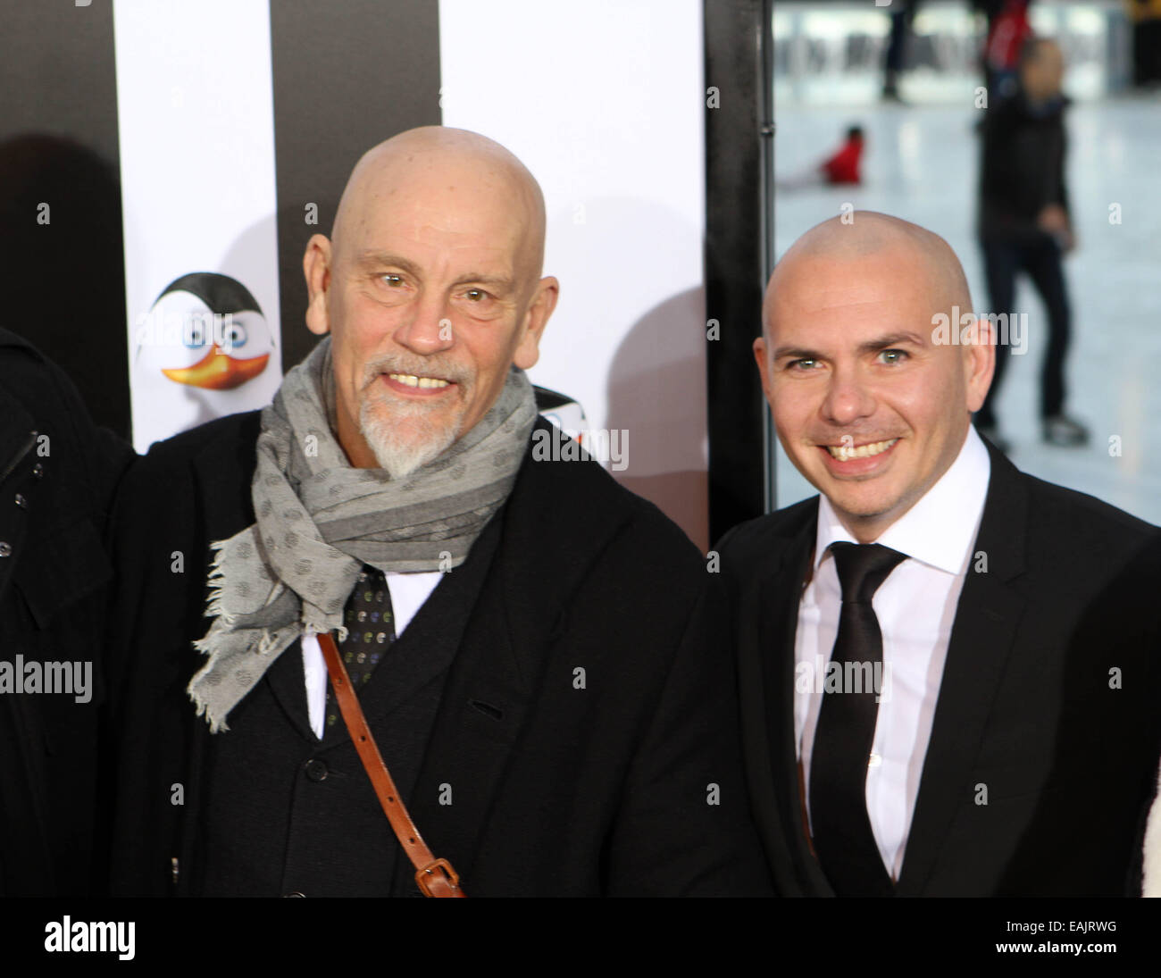 New York, USA. 16th Nov, 2014. Penguins of Madagascar Premiere @ Winter Village at Bryant Park Ice Rink in Manhattan.John Malkovitch & Pitbull Credit:  Bruce Cotler/Globe Photos/ZUMA Wire/Alamy Live News Stock Photo