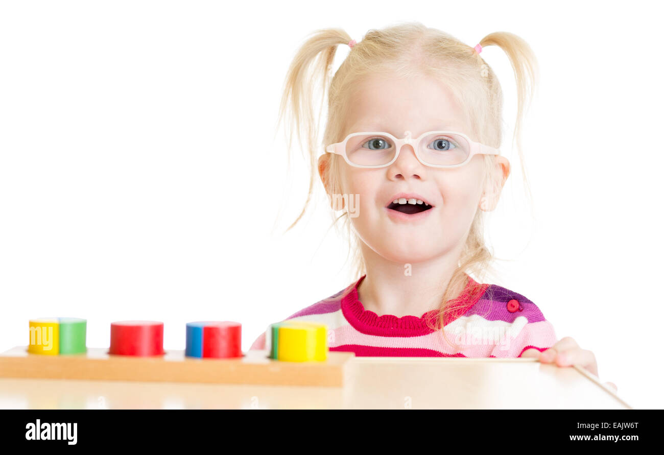 Funny child in eyeglases playing logical game isolated Stock Photo