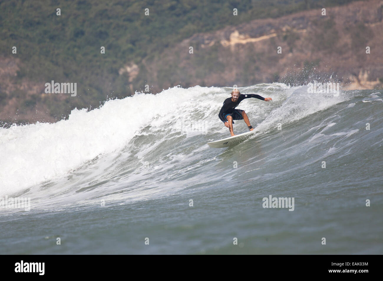 surfing in Indonesia Stock Photo