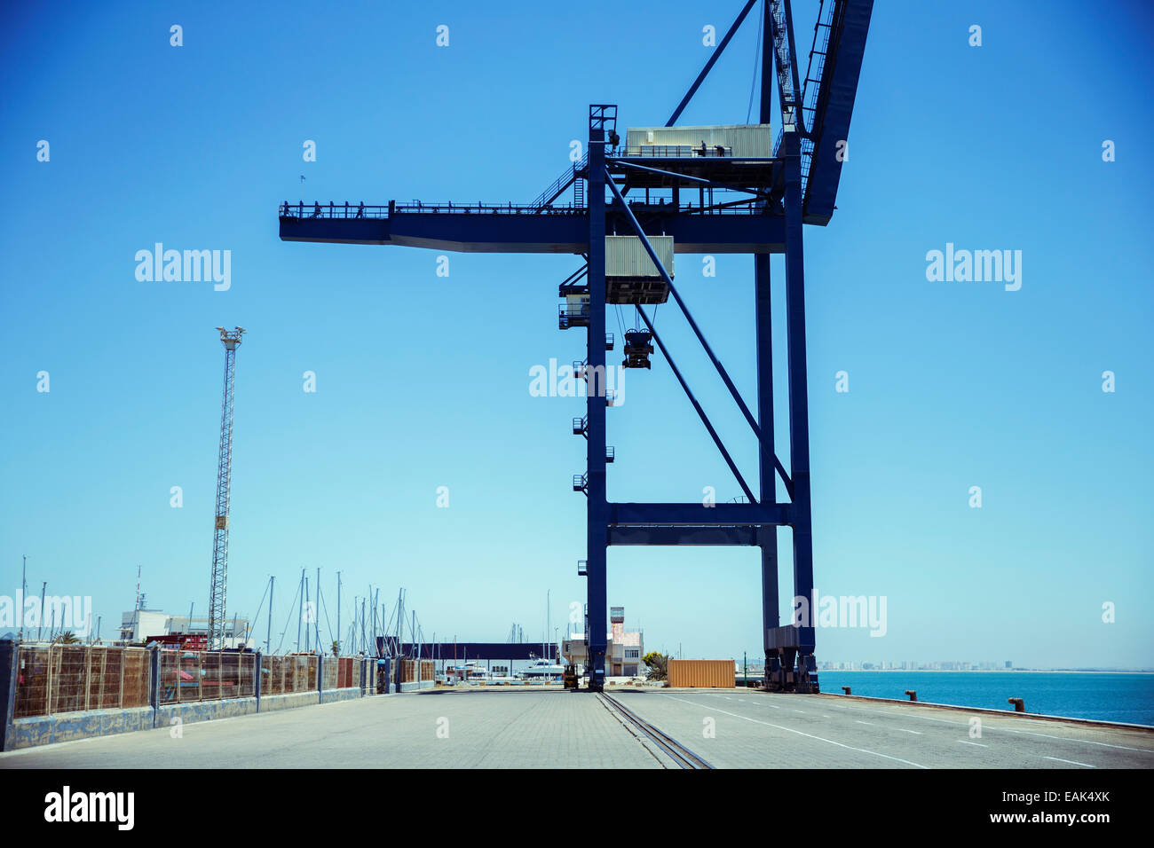 Cargo crane at waterfront Stock Photo