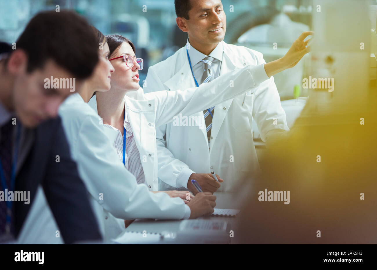 Scientists working in laboratory Stock Photo