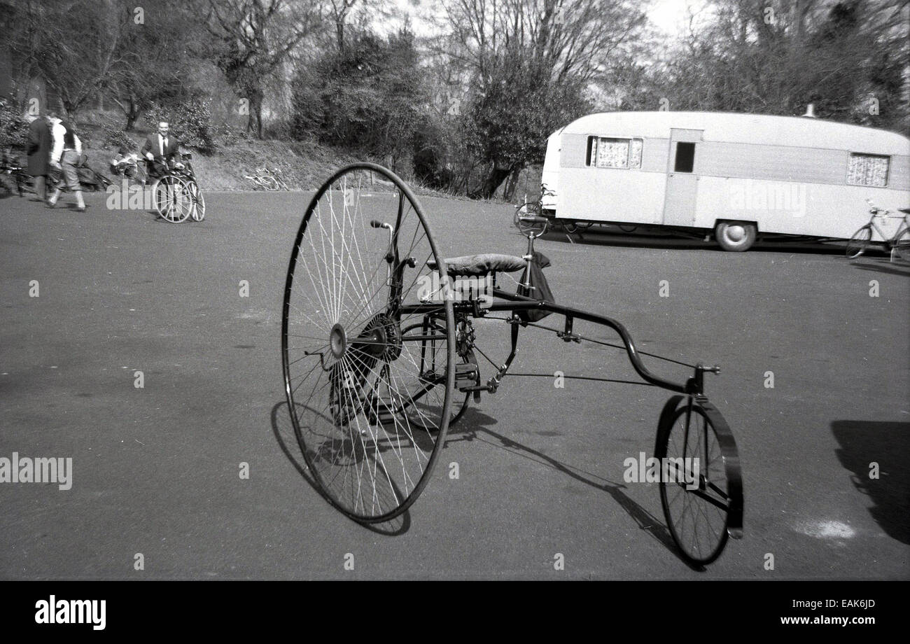 1960s, historical, picture shows an old English bicycle, made @1880. A tricycle with a large wheel and two smaller wheels. An unusual machine but had some advantages being easier to ride than a Penny Farthing and had a smoother ride. Stock Photo