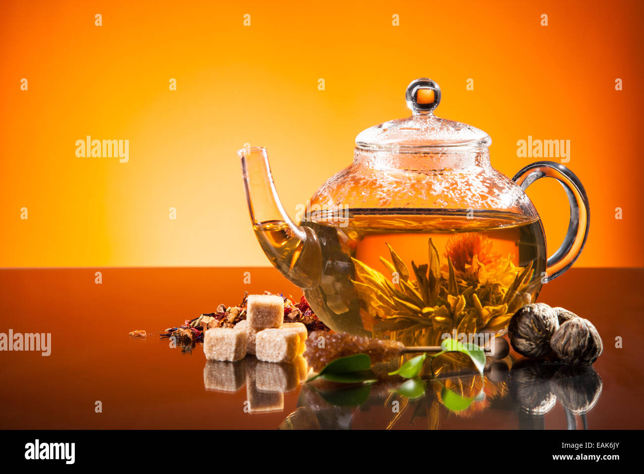 Teapot with blooming tea on glass Stock Photo Alamy