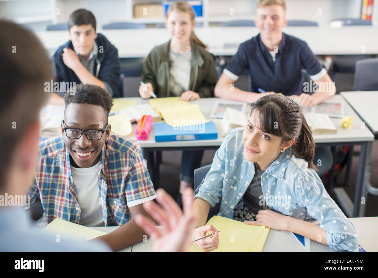 Cheerful High School students sitting in classroom Stock Photo - Alamy
