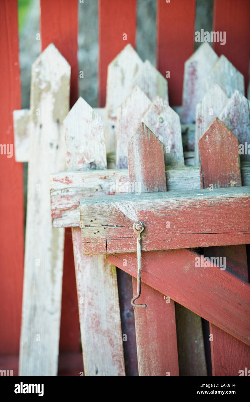 Home improvement, wooden fence stacked for repair and new paint. Stock Photo