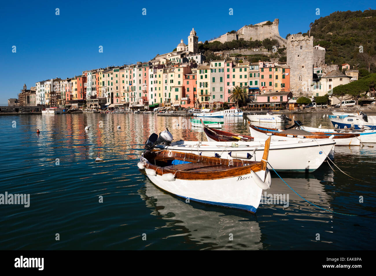 Fishing boats in the harbour in front of the historic town centre of Porto Venere, UNESCO World Cultural Heritage Site Stock Photo
