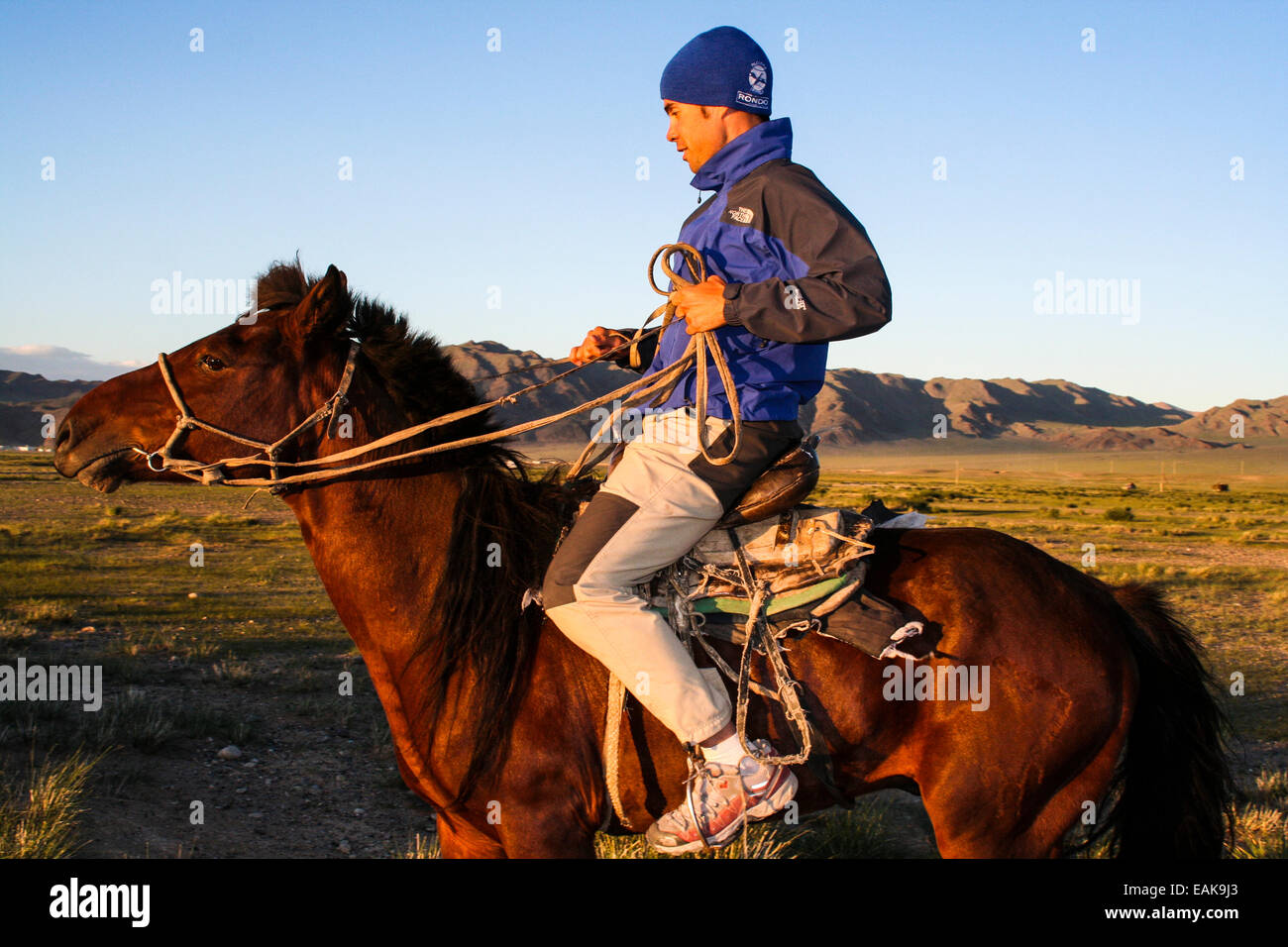 Man on a horse in the mountains hi-res stock photography and images - Alamy
