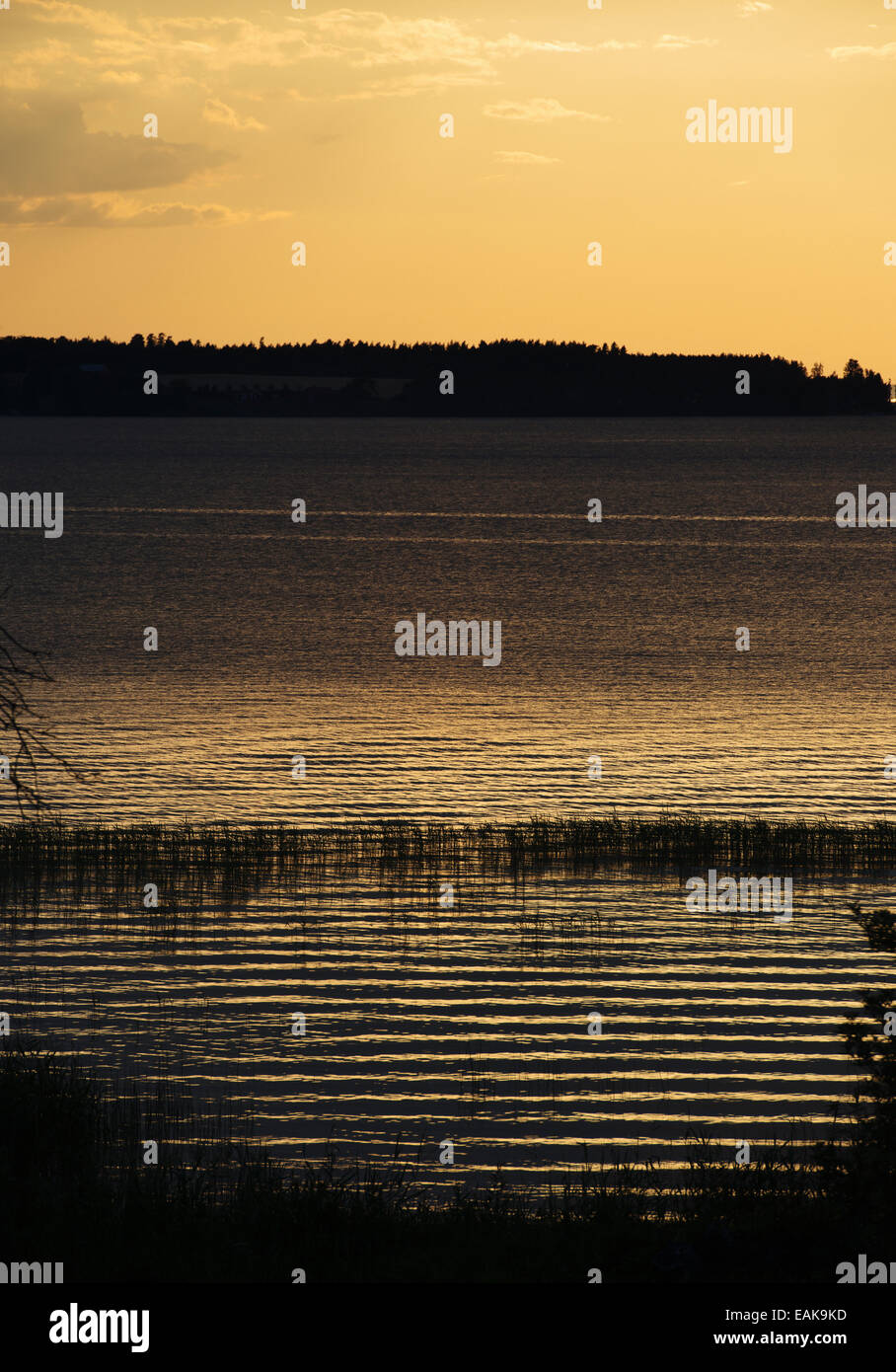 Tranquil landscape scene, Lake Vättern at dusk, Sweden. Stock Photo