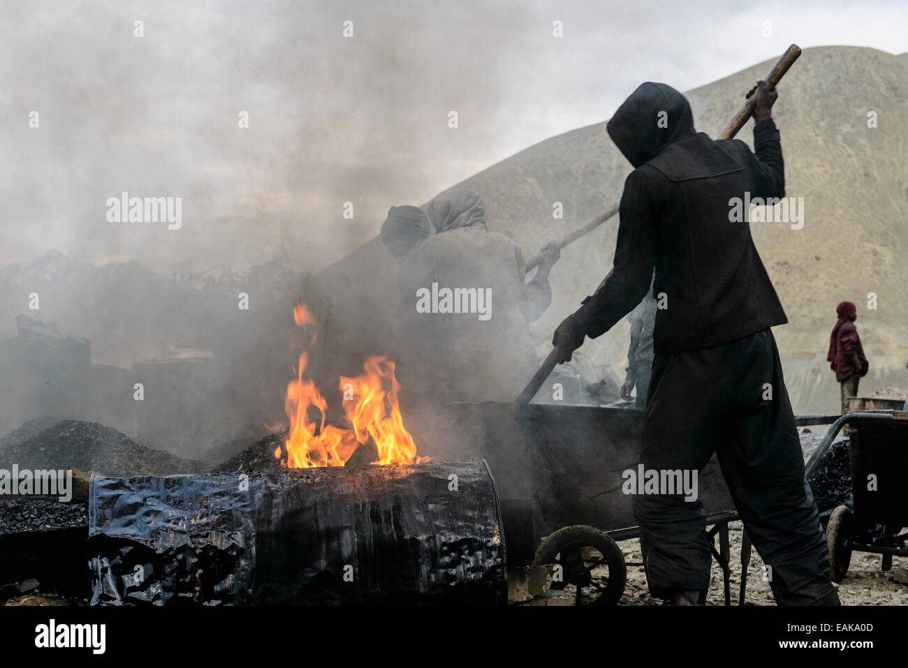 Road construction works, done under very unhealthy conditions for the workers, Lamayuru, Ladakh, Jammu and Kashmir, India Stock Photo