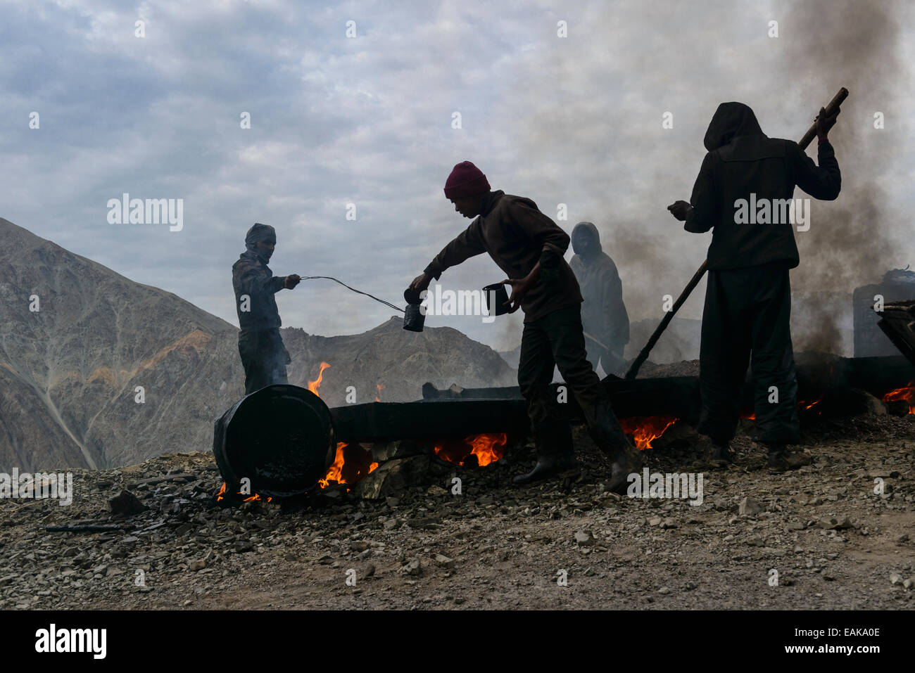 Road construction works, done under very unhealthy conditions for the workers, Lamayuru, Ladakh, Jammu and Kashmir, India Stock Photo