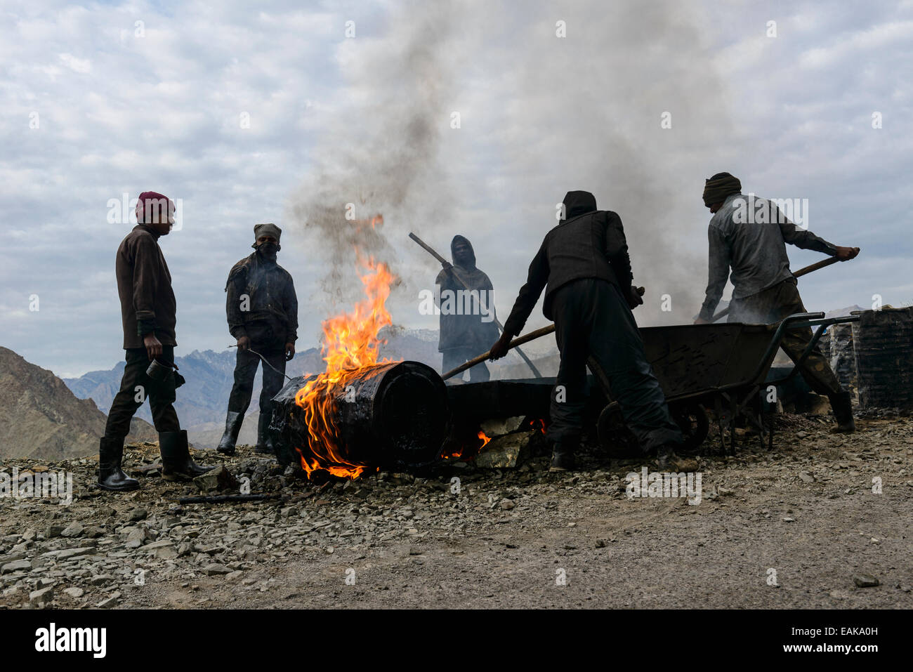 Road construction works, done under very unhealthy conditions for the workers, Lamayuru, Ladakh, Jammu and Kashmir, India Stock Photo