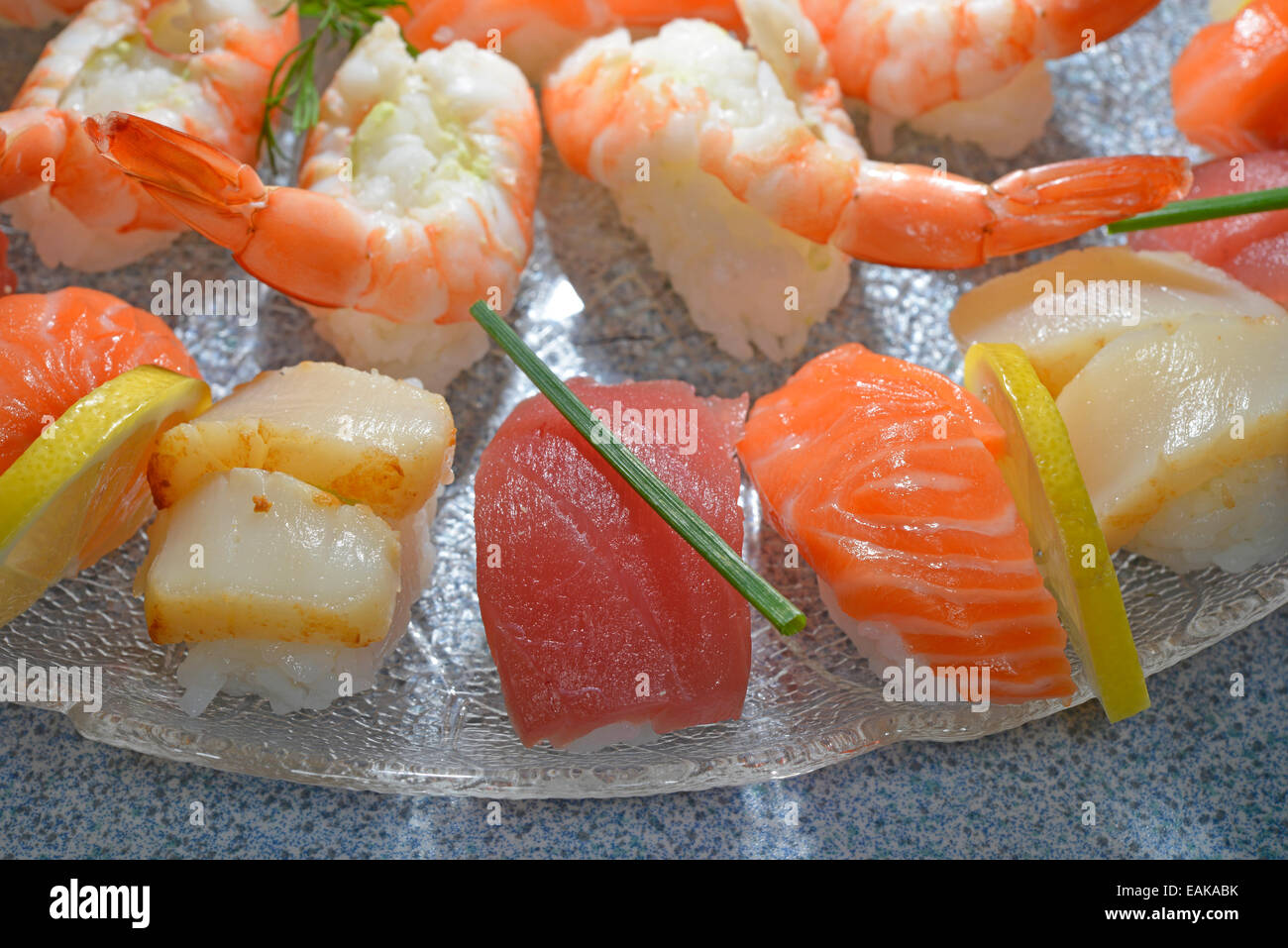 Nigiri sushi with salmon, tuna, scallops and prawns Stock Photo