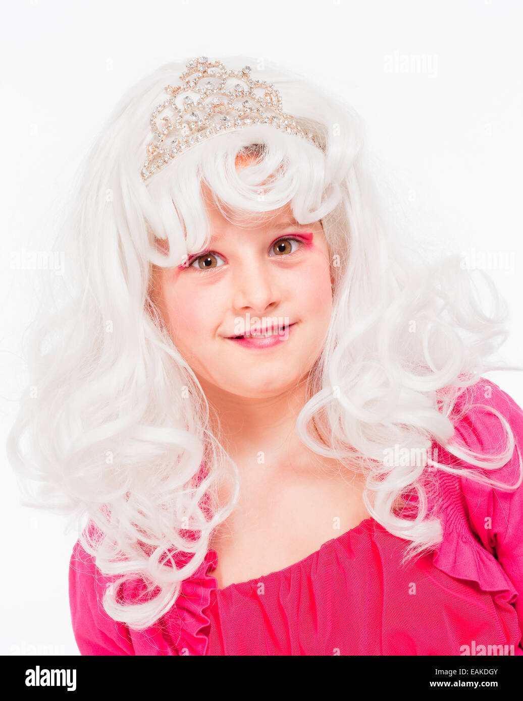 Young Girl in White Wig and Diadem Posing as Princess Stock Photo