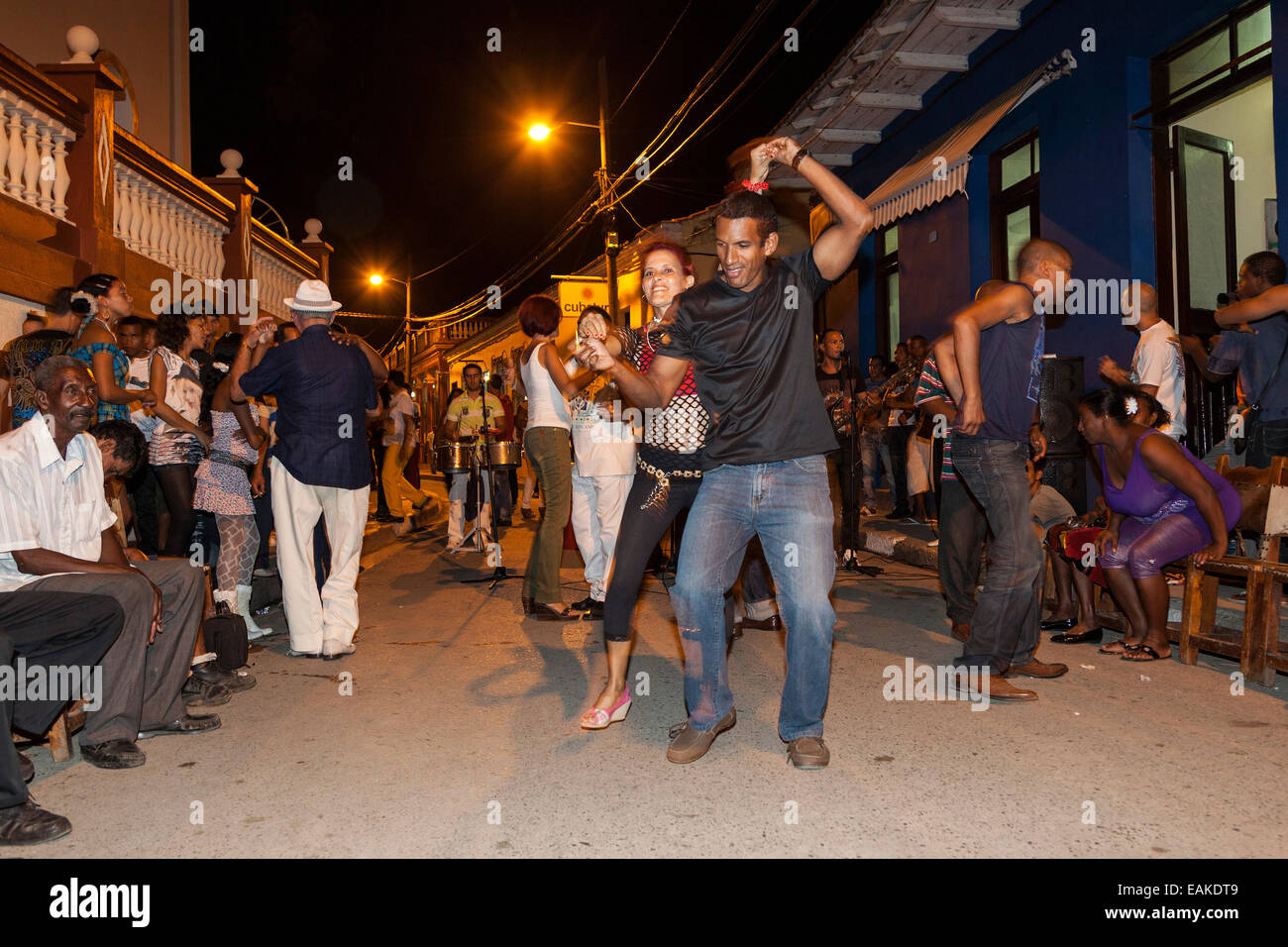 Music and dancing in the street, in the evening, Baracoa, Cuba Stock Photo