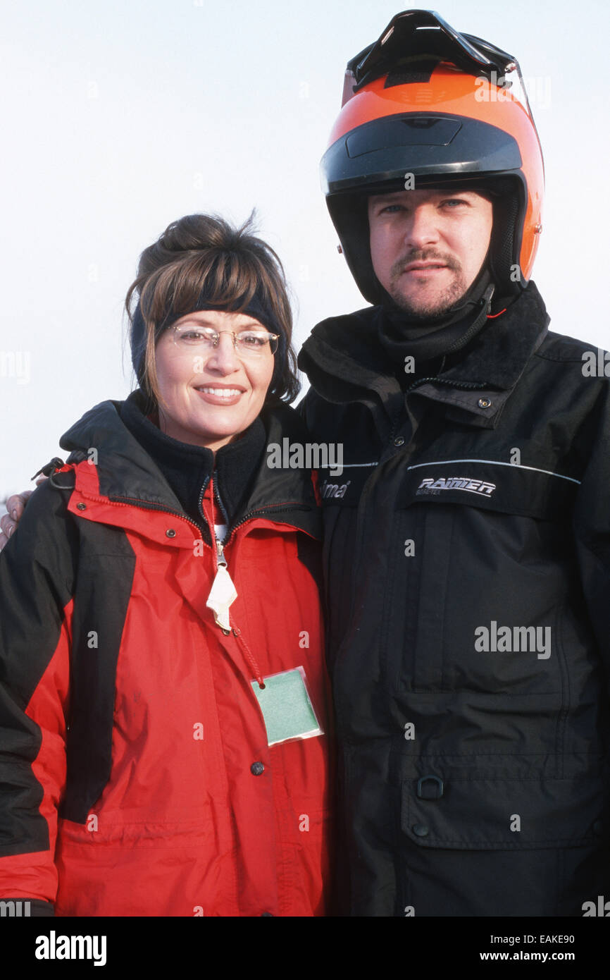 Mayor Of Wasilla Sarah Palin With Her Husband Todd Palin At The 2002 Iron Dog Snowmachine Race Start, Big Lake, Alaska Stock Photo
