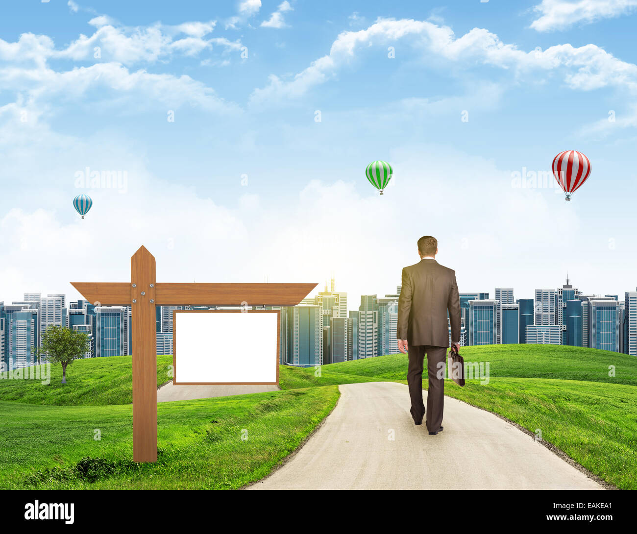 Businessman walks on road. Rear view. City skyline, grass field, wooden