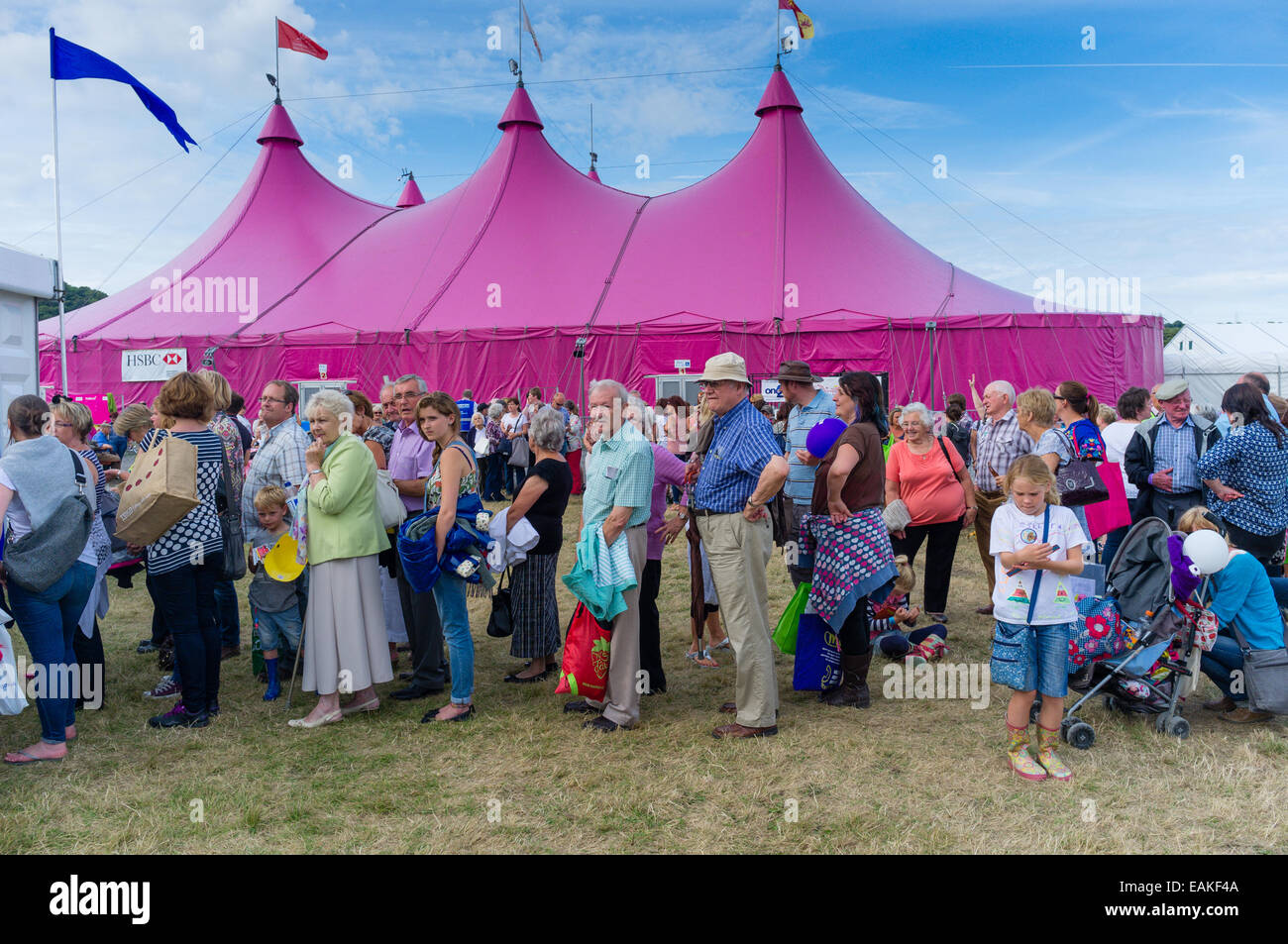 People queuing outside the iconic pink pavilion at the National Eisteddfod of Wales Llanelli, August 2014 Stock Photo