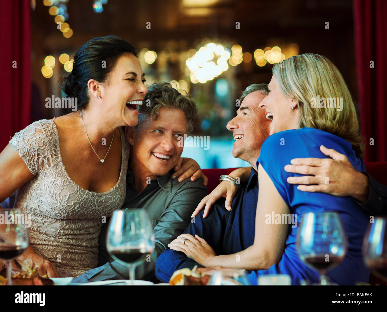 People having fun in restaurant Stock Photo - Alamy