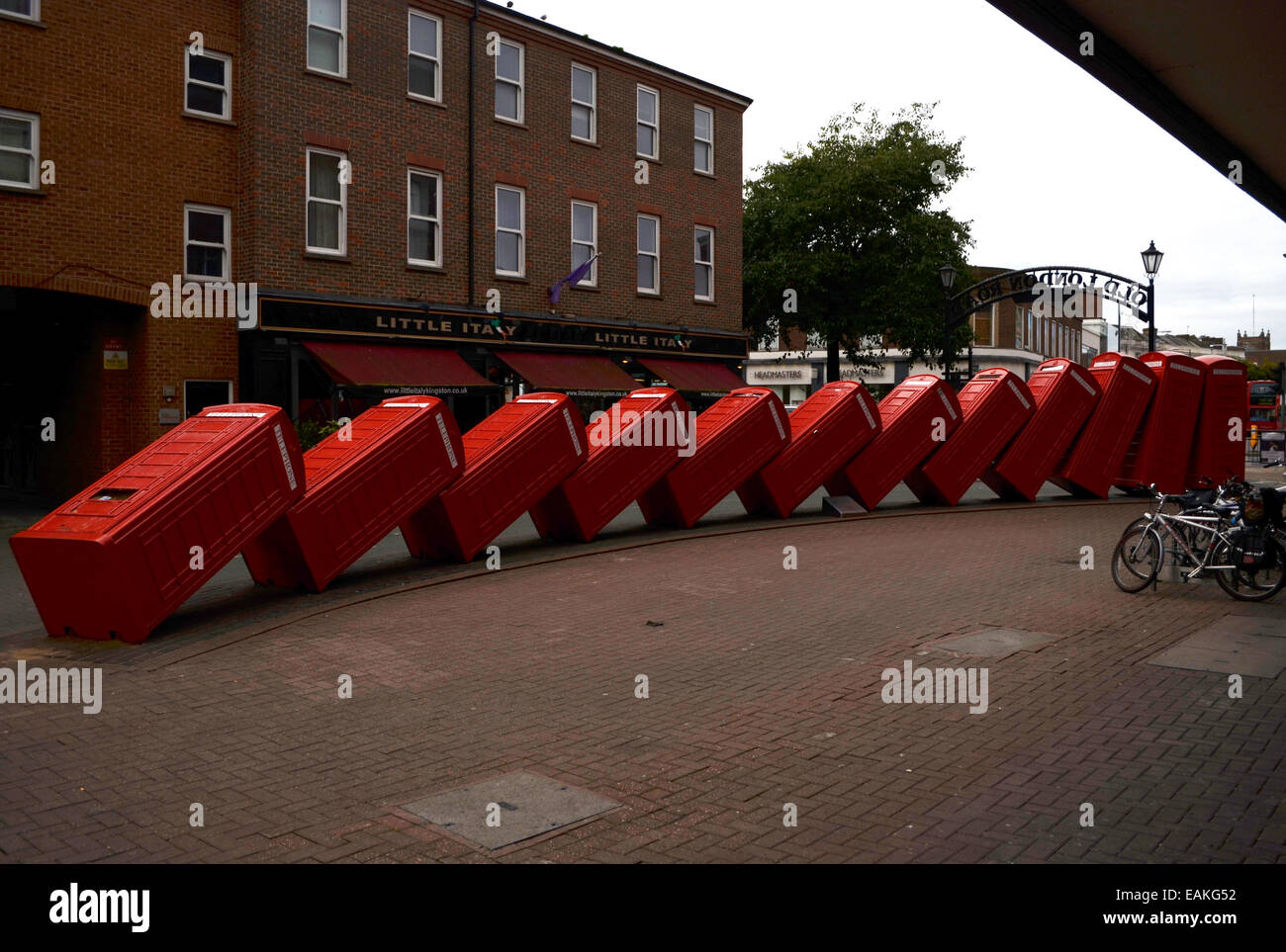 Tipsy telephone boxes,By David Mach Stock Photo