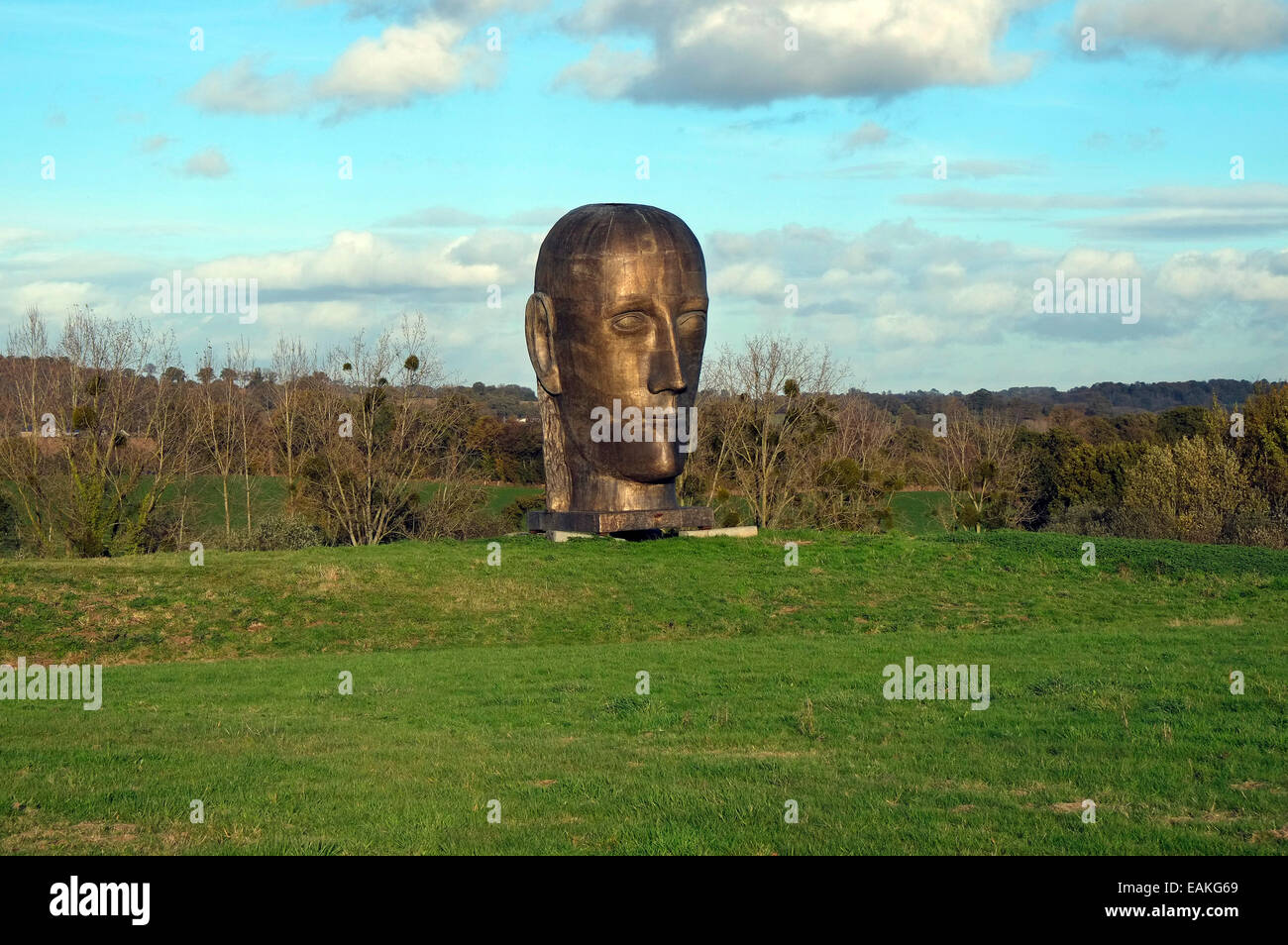 large bronze head sculpture in art park, ernee, normandy, france Stock Photo